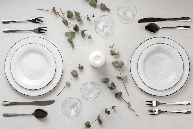 Table set with coordinated stemware and a centrepiece