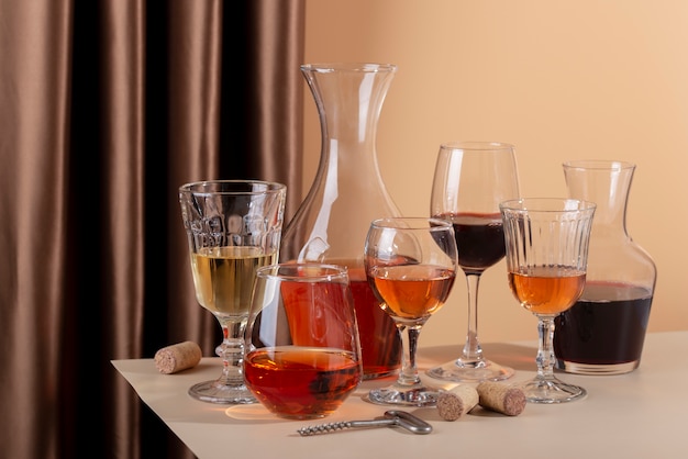 Crystal stemware and serving pieces arranged on a table, catching daylight