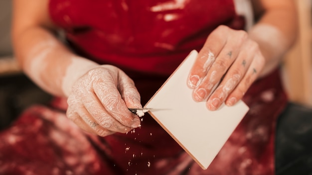 Crystal piece being wrapped in cloth with a handwritten gift card