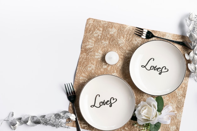 Two table settings side by side, one styled with guidance, one arranged on its own